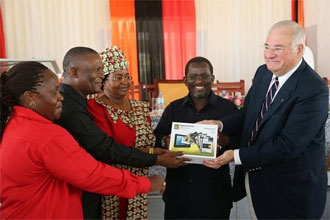 Joe Ricketts with Mrs. Salma Kikwete